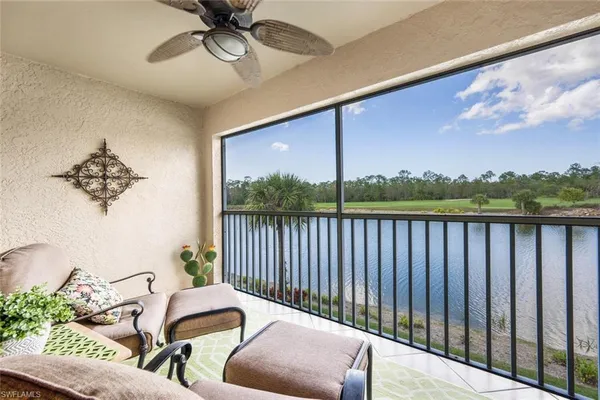 a view of balcony with furniture