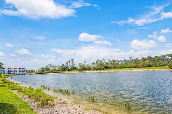 a view of a lake with a city