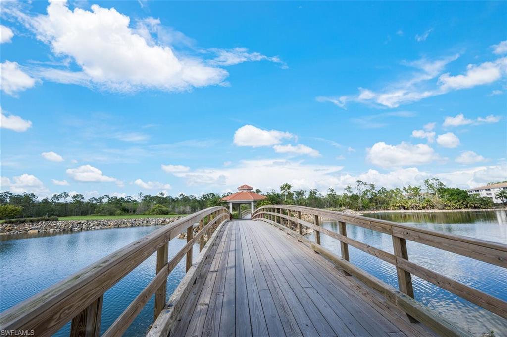 7635 Arbor Lake Court, Unit 2423 Naples, FL 34112 - Photo 27 of 50 a view of city and a lake