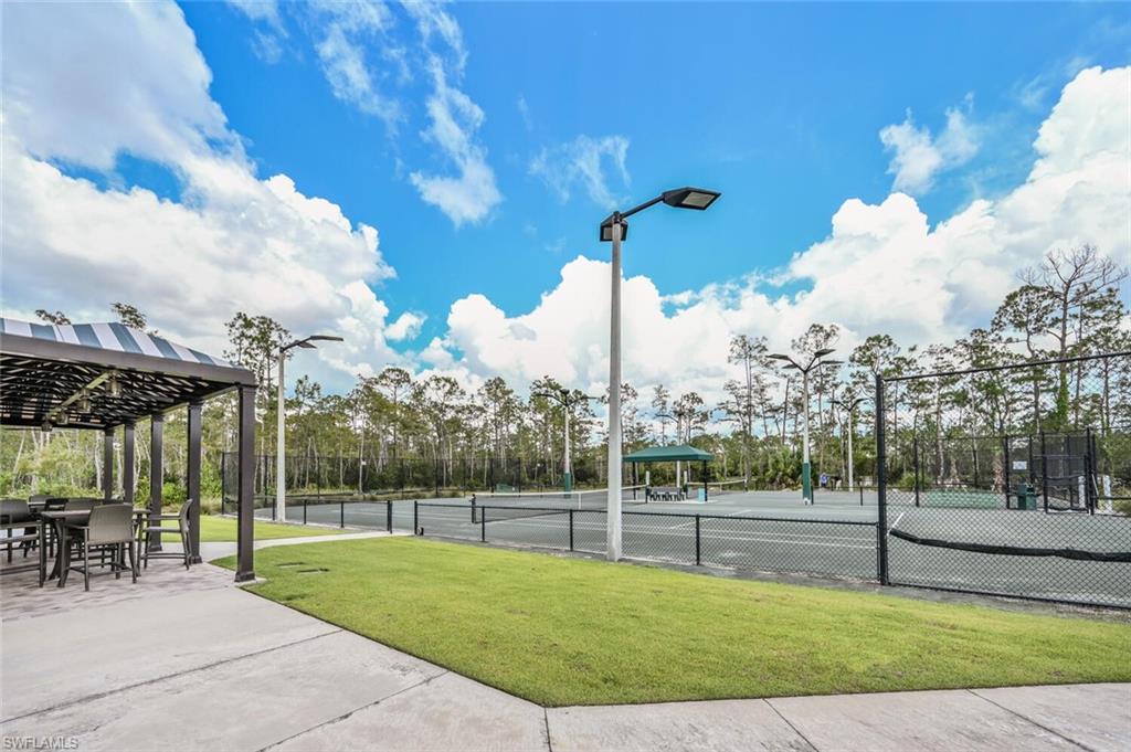 7635 Arbor Lake Court, Unit 2423 Naples, FL 34112 - Photo 35 of 50 a view of a playground