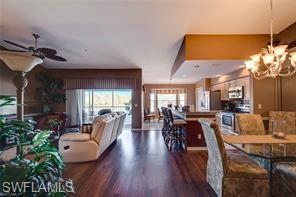 7635 Arbor Lake Court, Unit 2423 Naples, FL 34112 - Photo 49 of 50 a view of a dining room with furniture window and wooden floor
