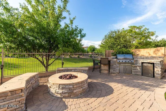 a view of a swimming pool with a patio