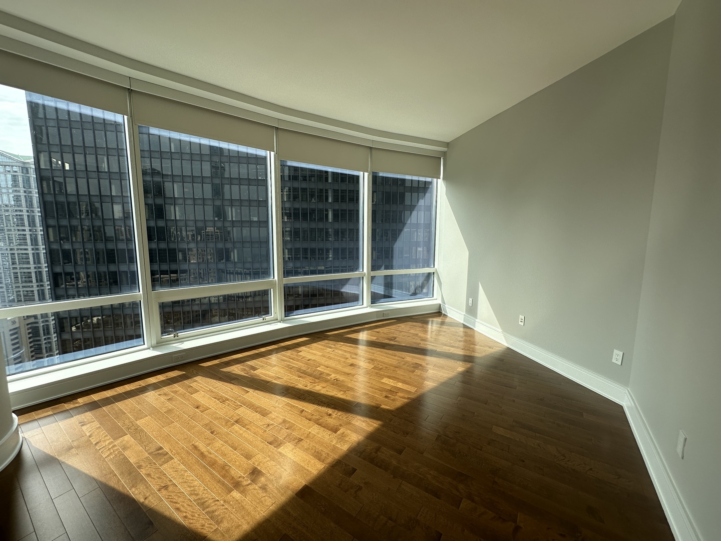 401 North Wabash Avenue, Unit 32H Chicago, IL 60611 - Photo 15 of 16 a view of an empty room and window
