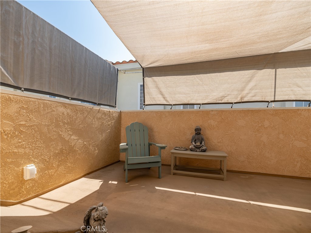 5330 Seabreeze Way Oxnard, CA 93035 - Photo 18 of 38 a bedroom with a bed and a cabinets