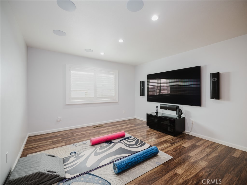 5330 Seabreeze Way Oxnard, CA 93035 - Photo 24 of 38 a living room with furniture and a flat screen tv