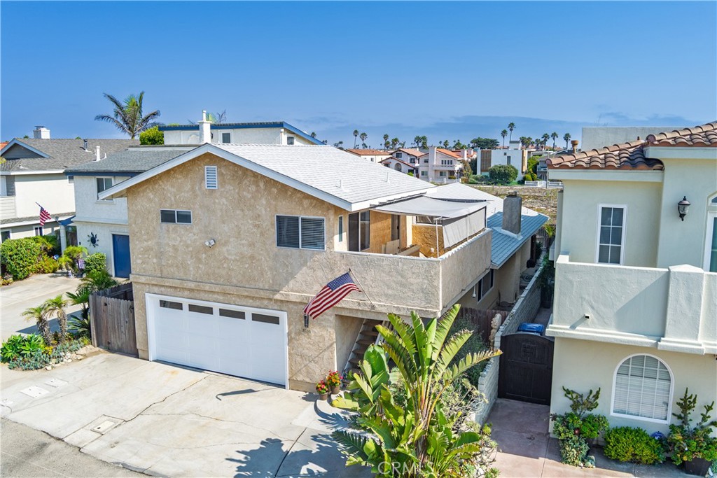 5330 Seabreeze Way Oxnard, CA 93035 - Photo 3 of 38 a view of a house with a tub and potted plants