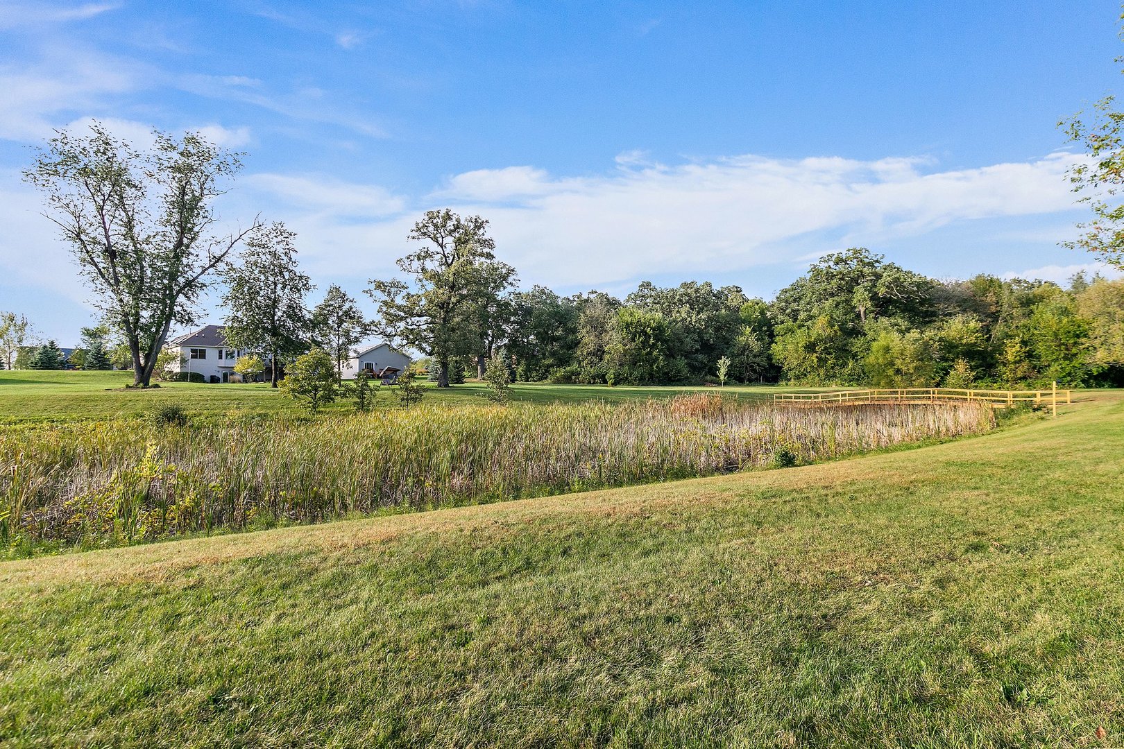 8908 South Hill Road Marengo, IL 60152 - Photo 15 of 53 a view of a lake with a yard