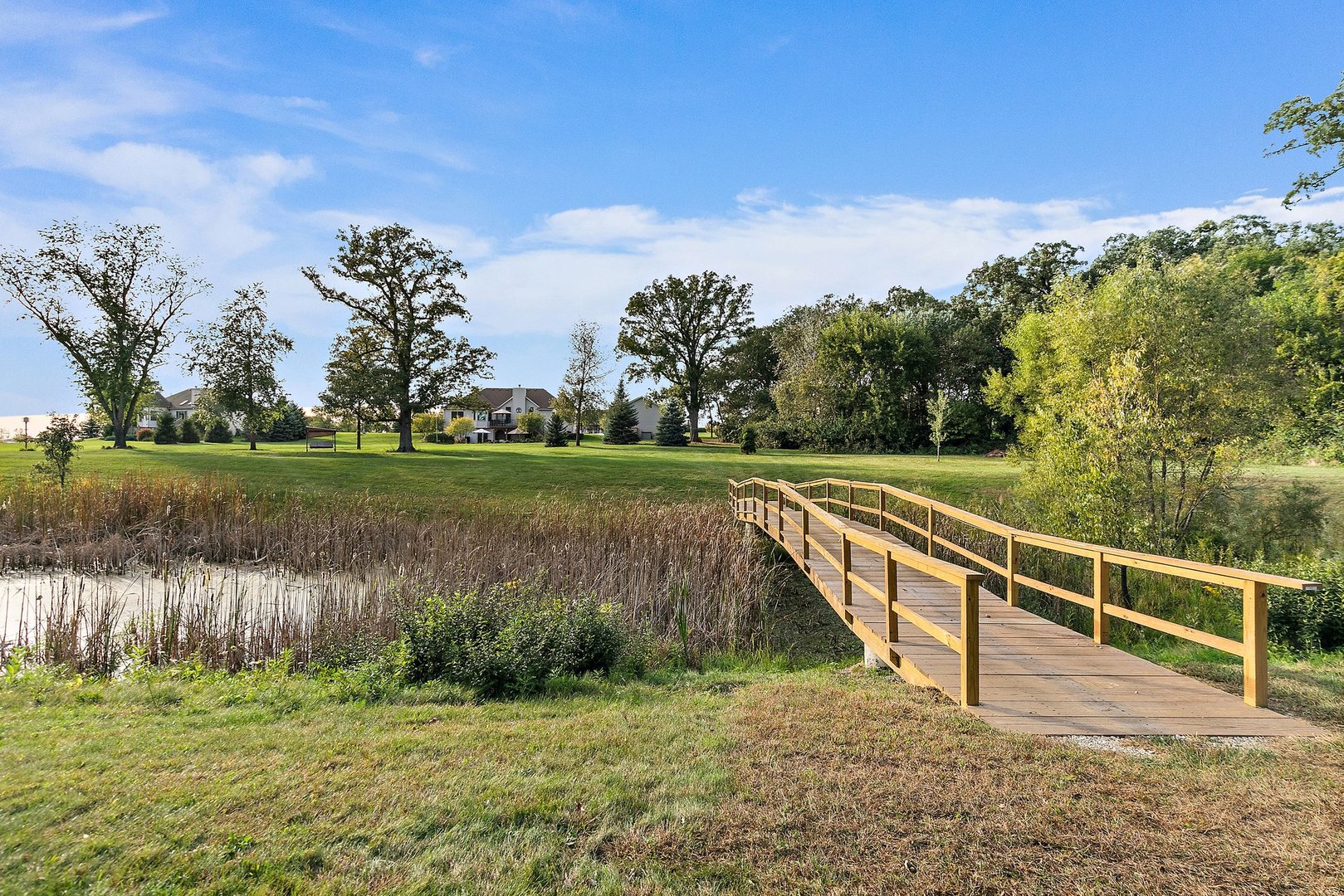 8908 South Hill Road Marengo, IL 60152 - Photo 16 of 53 a view of a lake with a yard