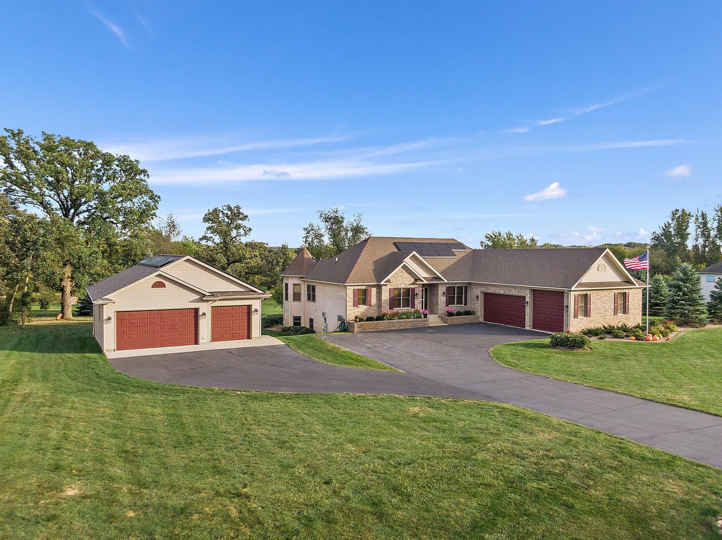 8908 South Hill Road Marengo, IL 60152 - Photo 17 of 53 a front view of a house with a garden