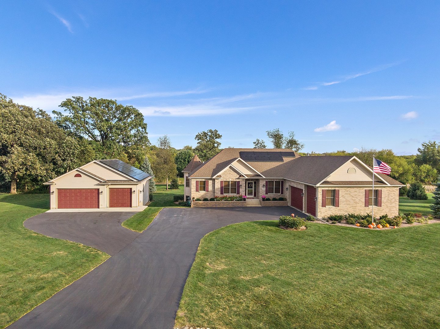 8908 South Hill Road Marengo, IL 60152 - Photo 19 of 53 a front view of a house with a yard