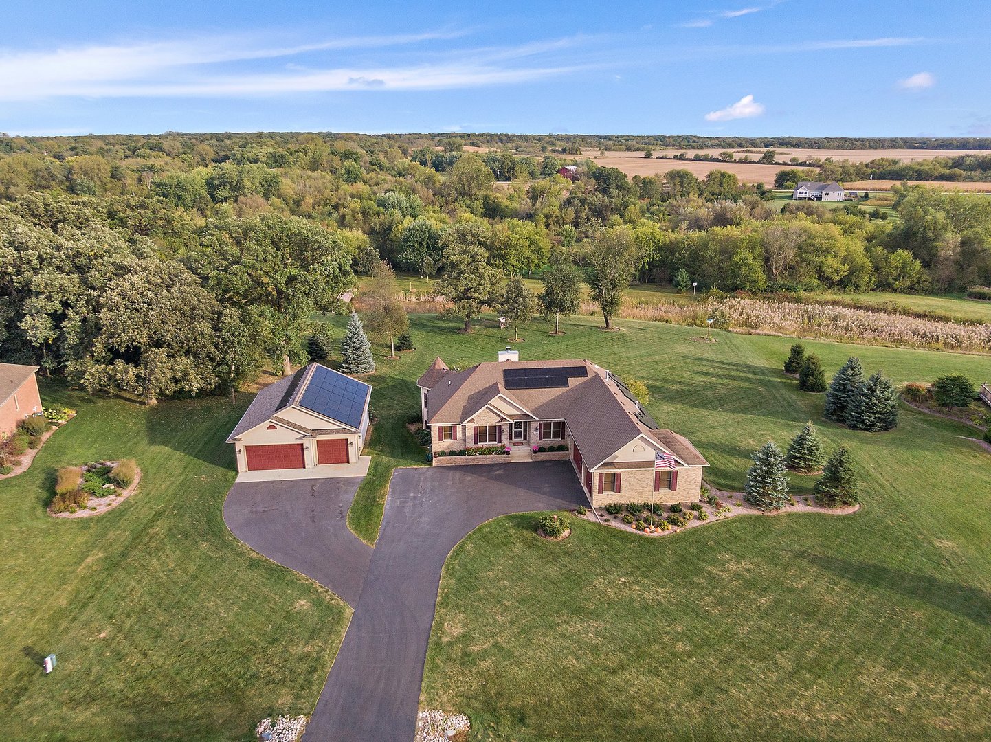 8908 South Hill Road Marengo, IL 60152 - Photo 20 of 53 an aerial view of a house with garden space and outdoor seating
