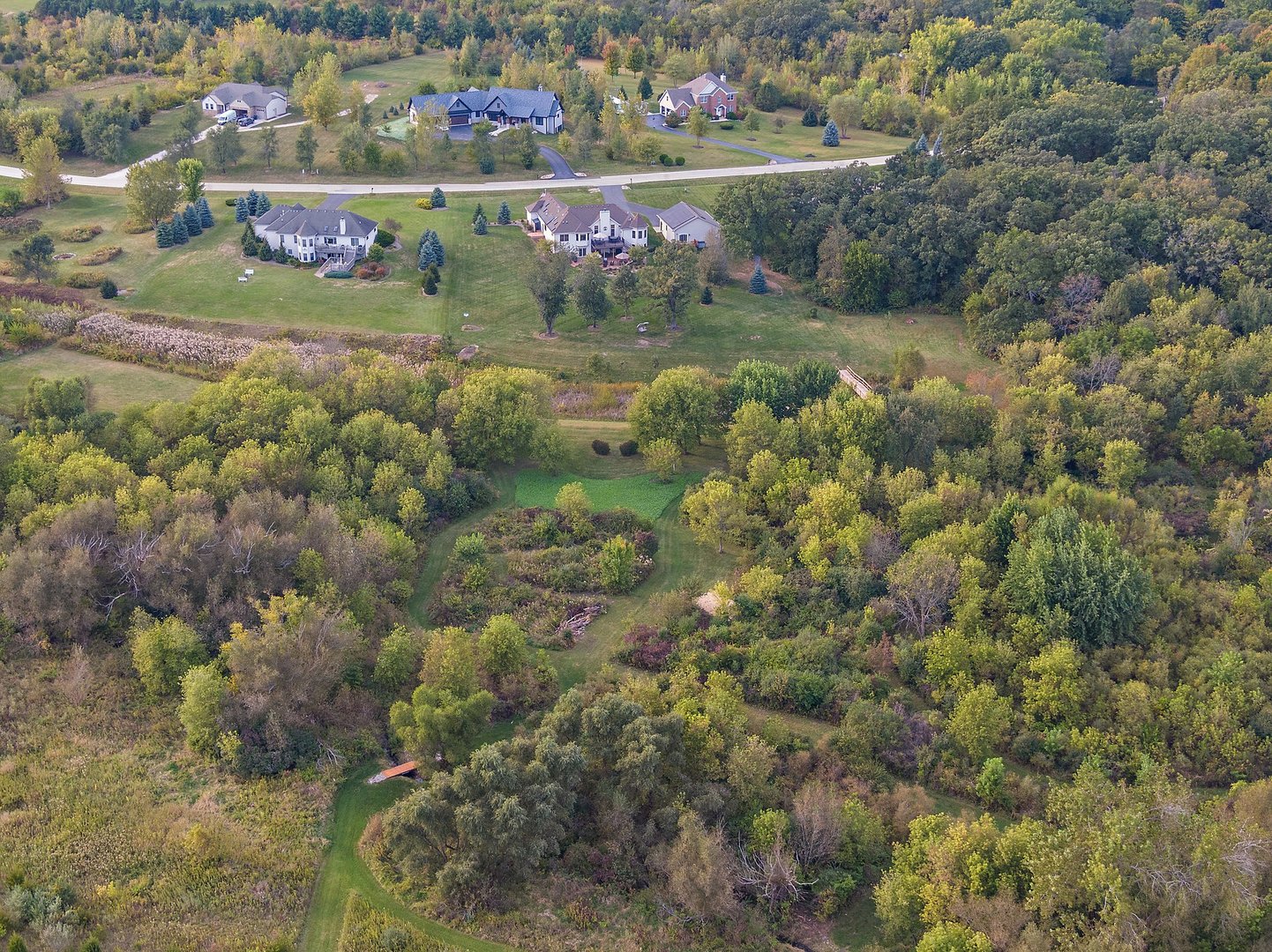 8908 South Hill Road Marengo, IL 60152 - Photo 24 of 53 a view of a lake with houses