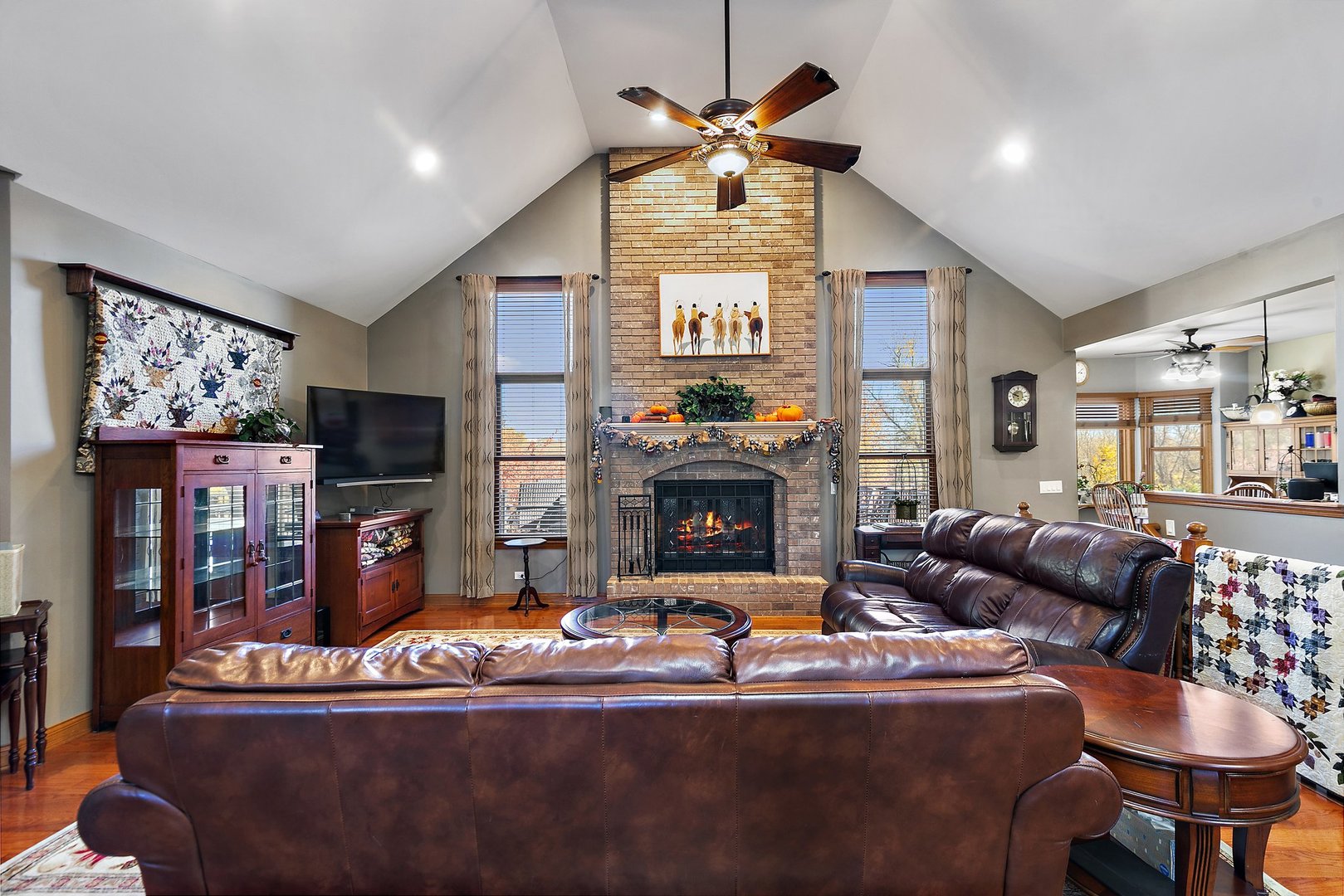 8908 South Hill Road Marengo, IL 60152 - Photo 34 of 53 a living room with fireplace furniture and a flat screen tv
