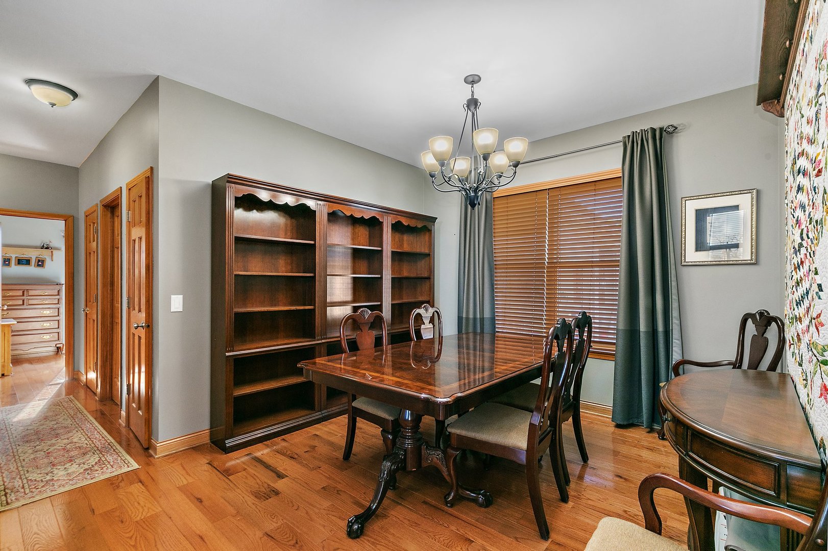 8908 South Hill Road Marengo, IL 60152 - Photo 37 of 53 a view of a dining room with furniture window and wooden floor
