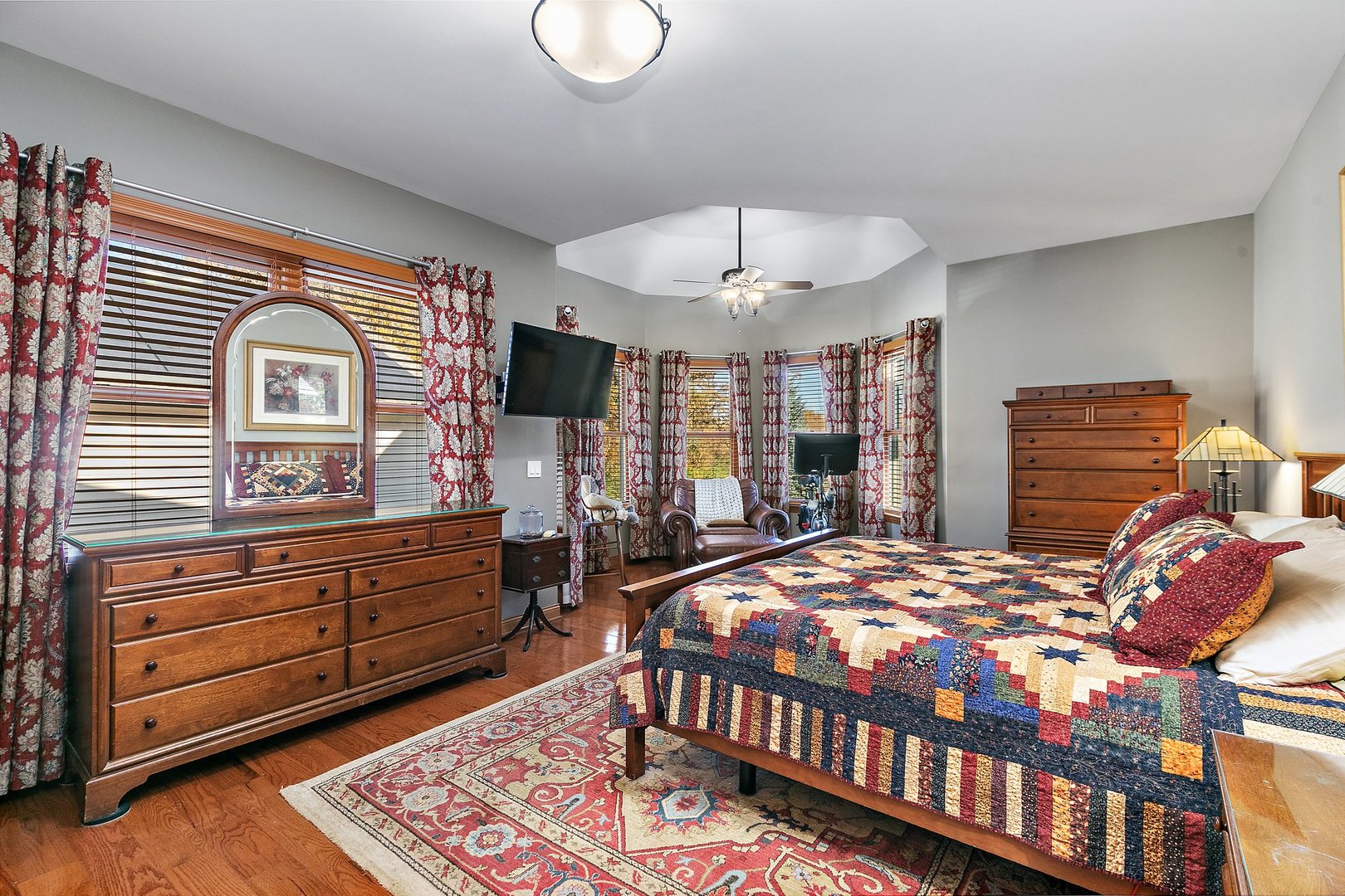 8908 South Hill Road Marengo, IL 60152 - Photo 42 of 53 a bed room with a bed and a chandelier
