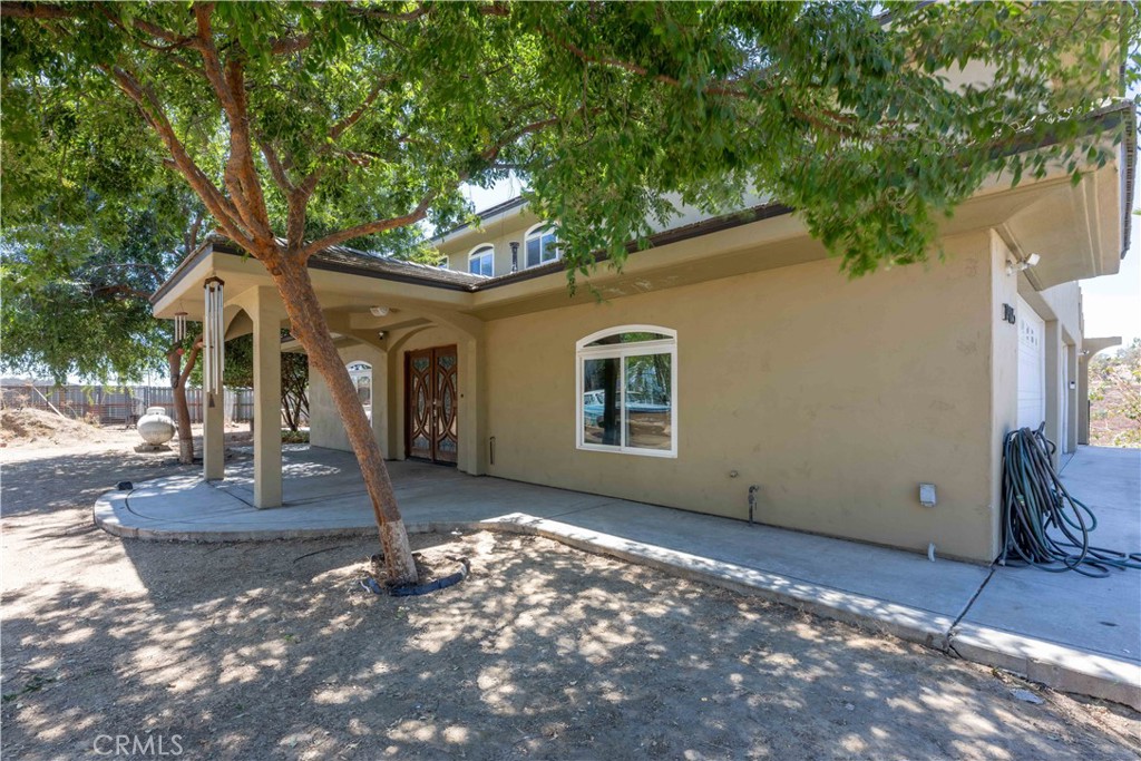 19075 Caesar Drive Ramona, CA 92065 - Photo 12 of 75 a view of a house with a tree