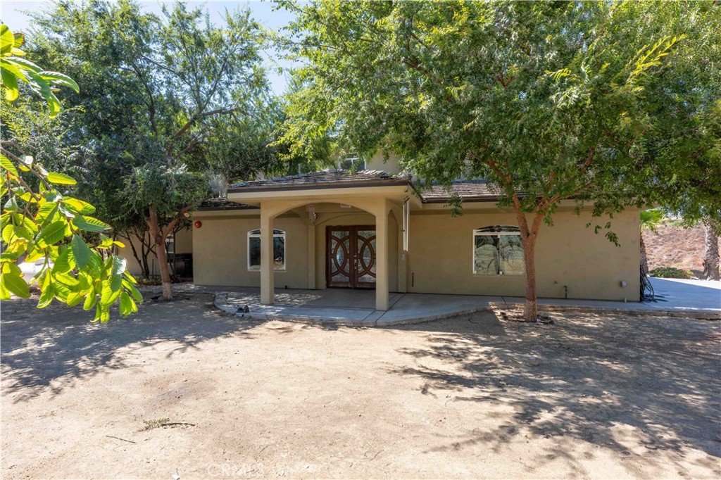19075 Caesar Drive Ramona, CA 92065 - Photo 13 of 75 a view of a house with a tree in the background