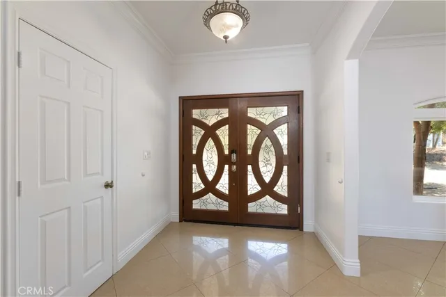 a kitchen with stainless steel appliances granite countertop wooden cabinets a stove and a sink