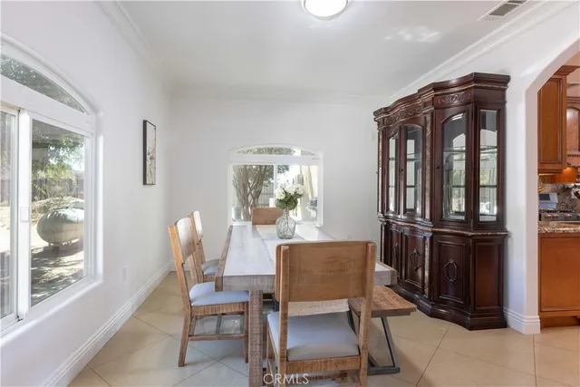 a view of kitchen with cabinets and stainless steel appliances