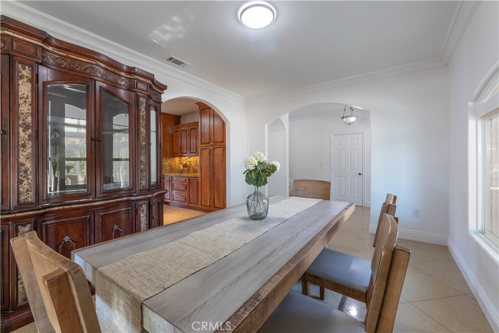 19075 Caesar Drive Ramona, CA 92065 - Photo 19 of 75 a dining room with furniture and window