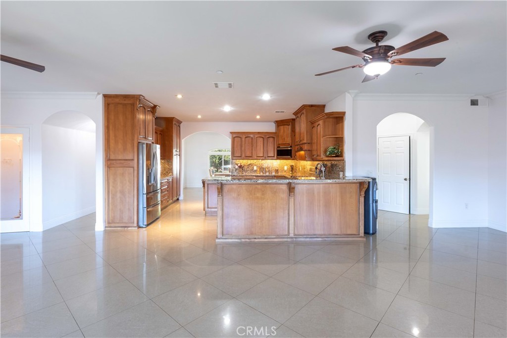 19075 Caesar Drive Ramona, CA 92065 - Photo 23 of 75 a view of kitchen with cabinets and stainless steel appliances