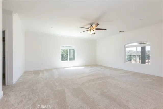 a bathroom with a glass door shower