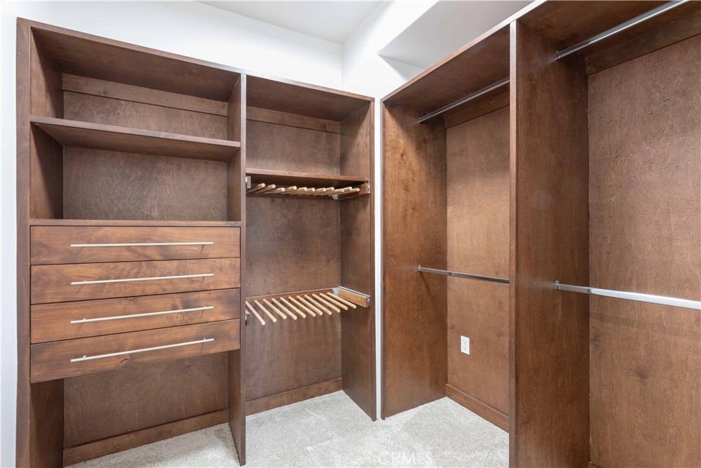 19075 Caesar Drive Ramona, CA 92065 - Photo 44 of 75 a view of walk in closet with empty racks