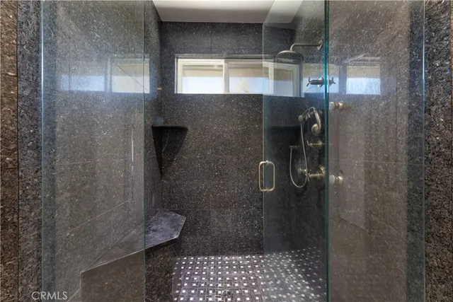 a view of a bathroom from a hallway