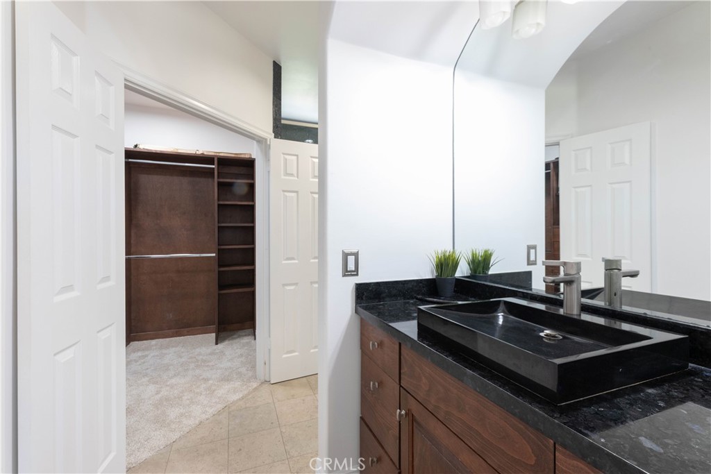 19075 Caesar Drive Ramona, CA 92065 - Photo 49 of 75 a kitchen with a sink and a refrigerator