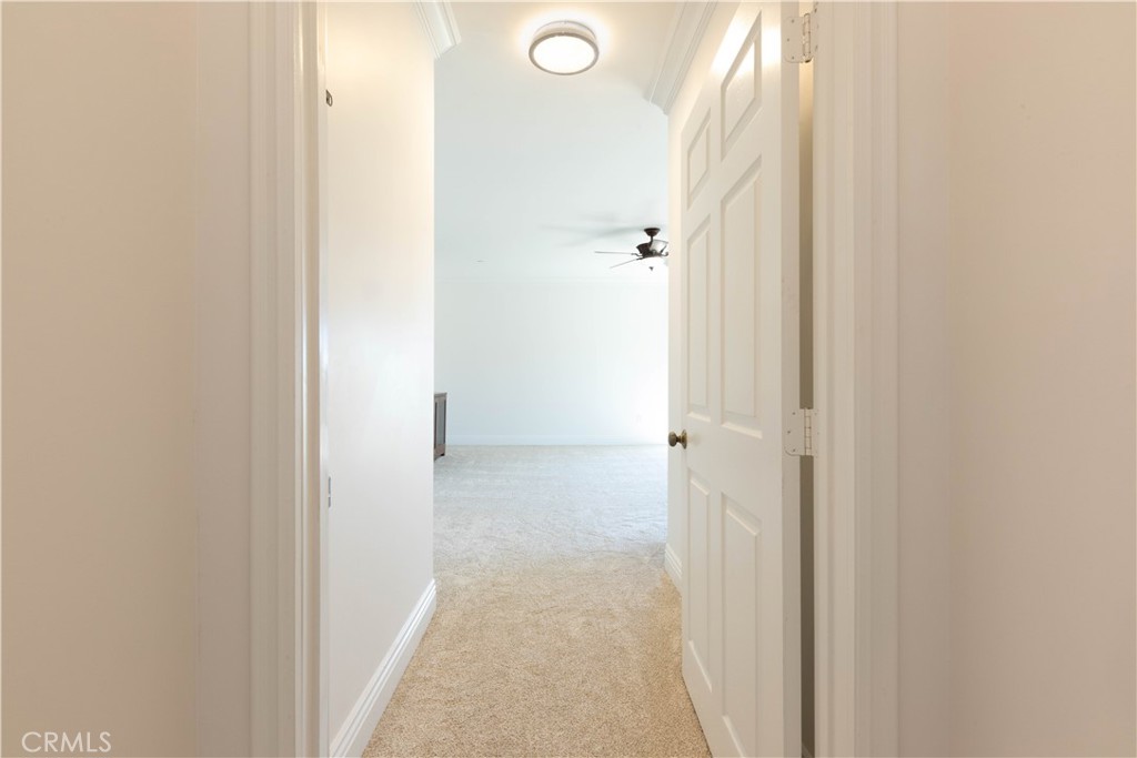 19075 Caesar Drive Ramona, CA 92065 - Photo 66 of 75 a view of a bathroom from a hallway