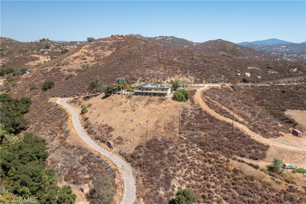 19075 Caesar Drive Ramona, CA 92065 - Photo 75 of 75 a view of a forest with mountains in the background