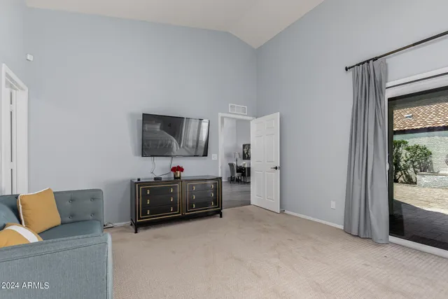 a spacious bathroom with a bathtub shower and sink