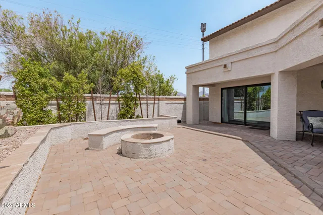 a view of a livingroom with furniture and a rug