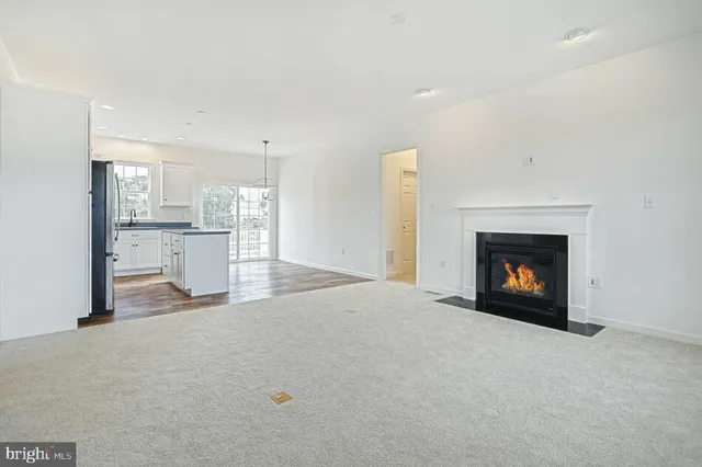a view of a kitchen with a fireplace and a fireplace