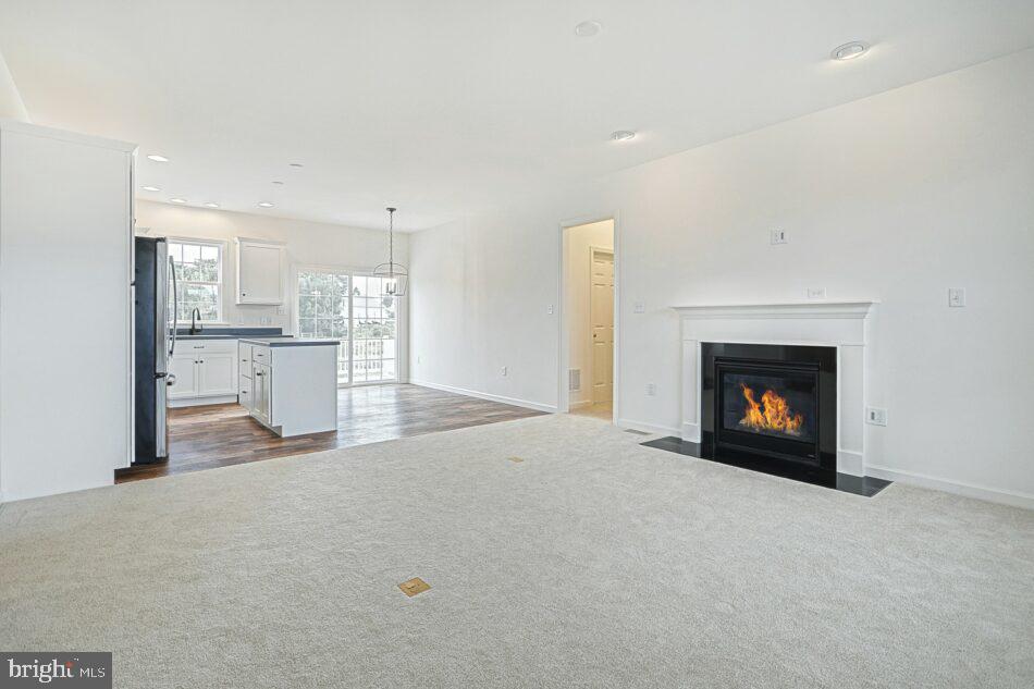 0 Old Orch Road, Unit CAMPBELL Strasburg, PA 17579 - Photo 5 of 14 a view of a kitchen with a fireplace and a fireplace
