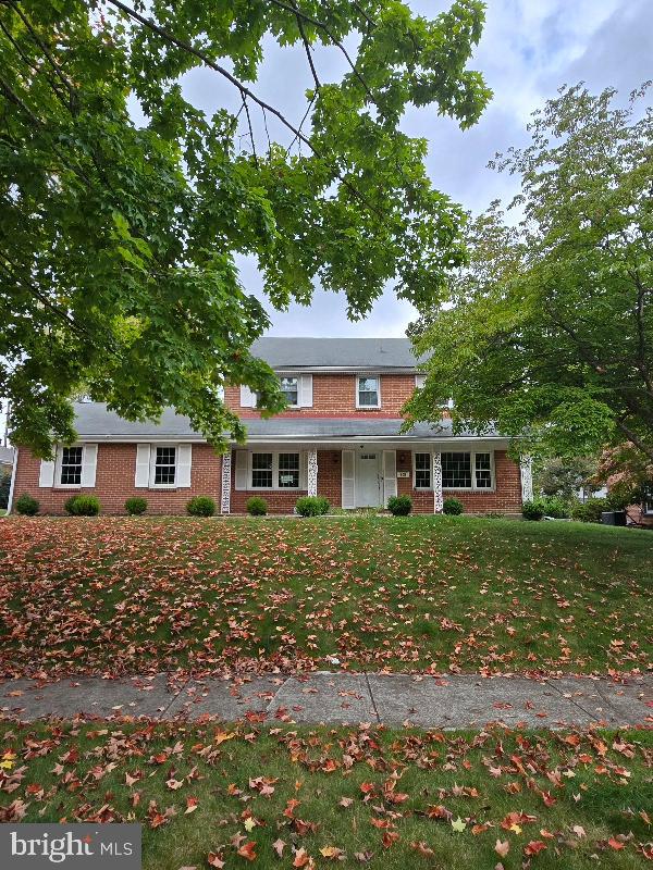 705 Ashford Road Wilmington, DE 19803 - Photo 2 of 30 a front view of a house with a garden