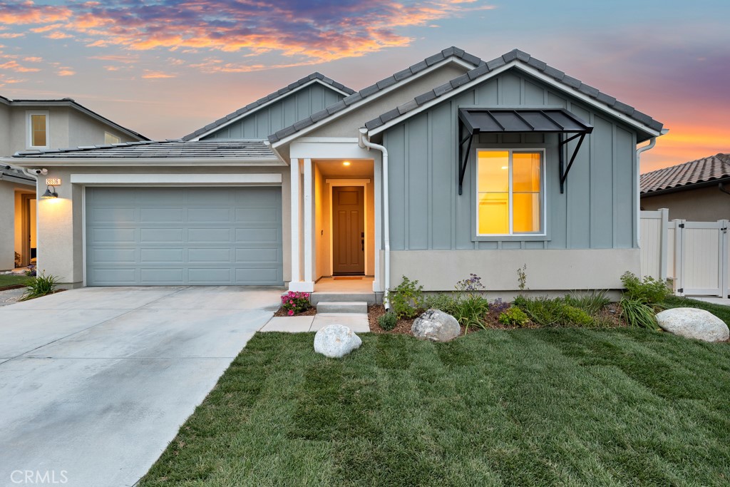 28536 Daybreak Way Saugus, CA 91350 - Photo 1 of 32 a front view of a house with garden