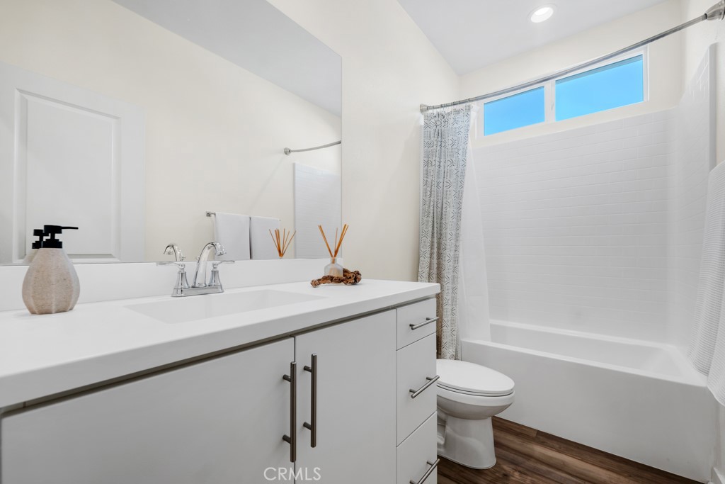 28536 Daybreak Way Saugus, CA 91350 - Photo 18 of 32 a bathroom with a sink toilet and shower