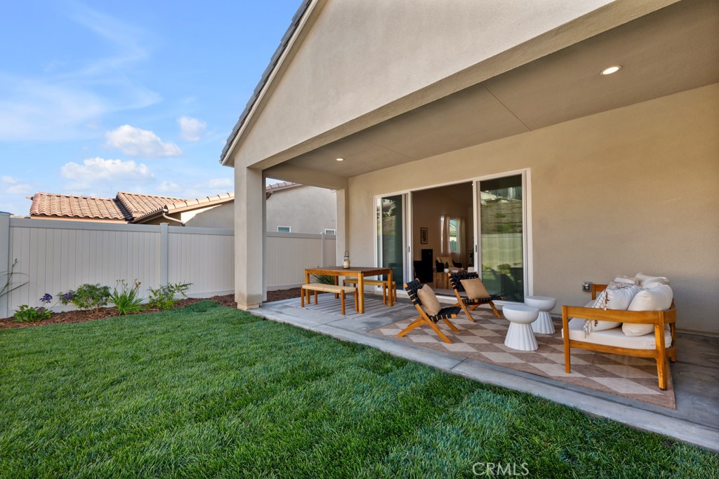 28536 Daybreak Way Saugus, CA 91350 - Photo 10 of 32 a view of a backyard with sitting area