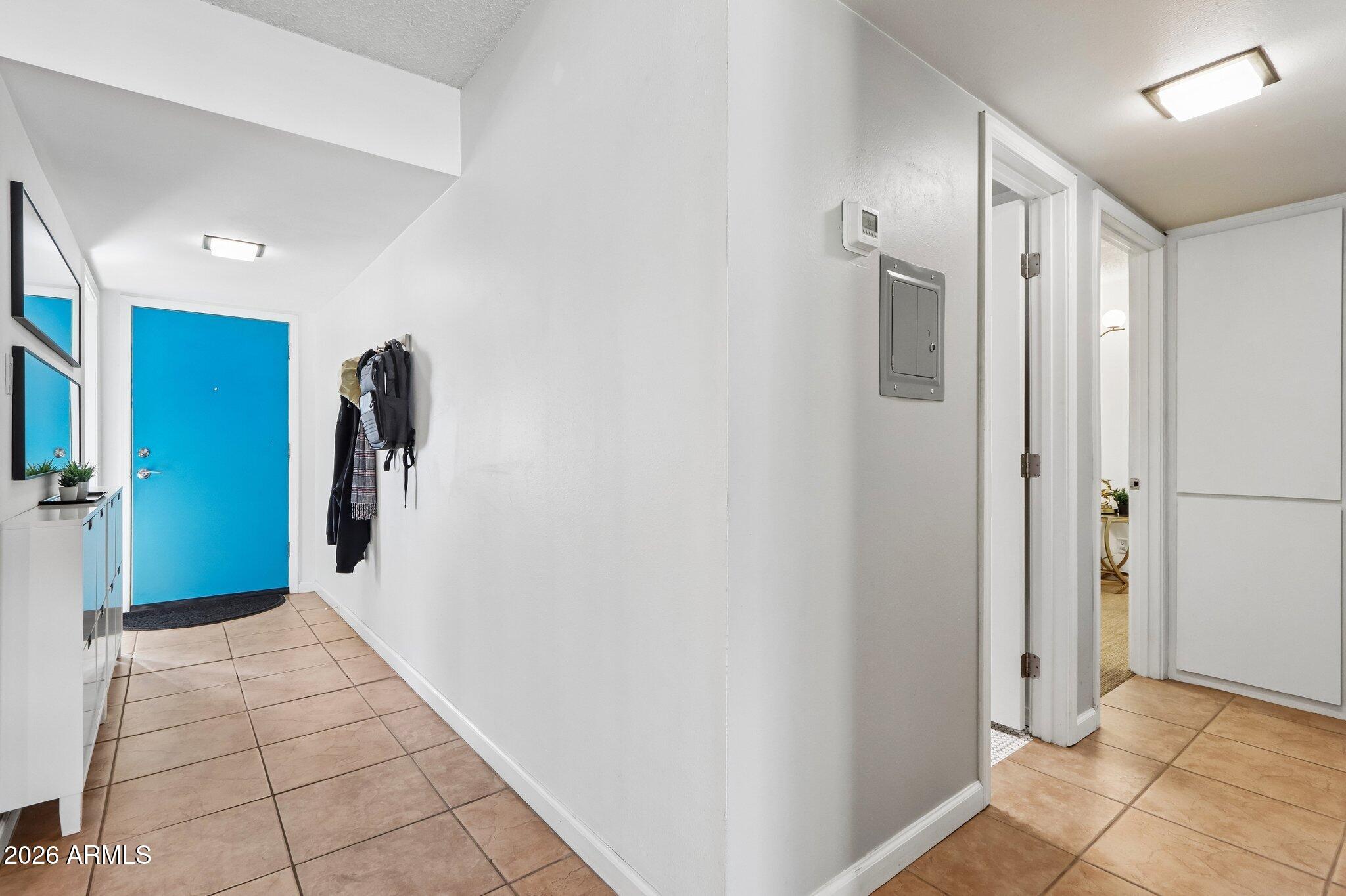 1107 West Osborn Road, Unit 114 Phoenix, AZ 85013 - Photo 2 of 49 Foyer/entry Hall and bedroom hallway