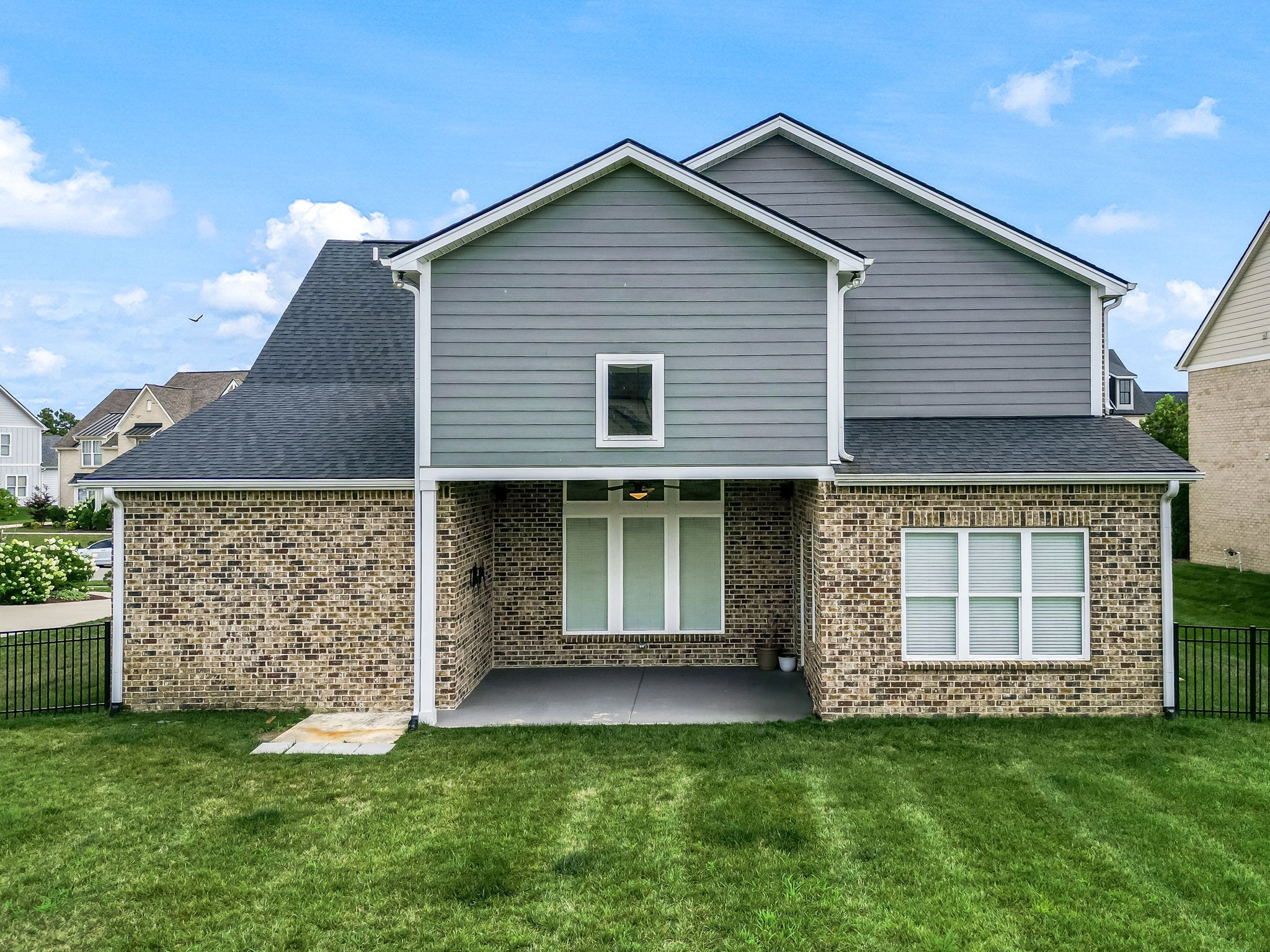 863 Plowson Road Mount Juliet, TN 37122 - Photo 50 of 59 a front view of a house with a garden