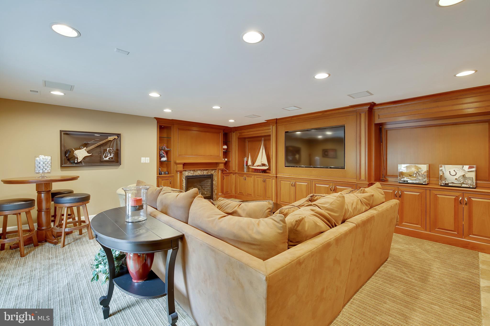 10416 Grey Fox Road Potomac, MD 20854 - Photo 50 of 71 LL rec room w/ wall-to-wall cherry built-ins