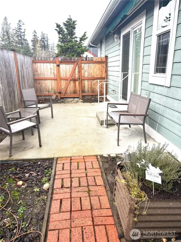 a view of a backyard of the house