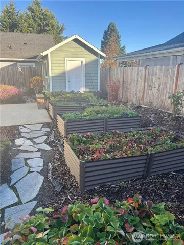 a view of an empty room with windows