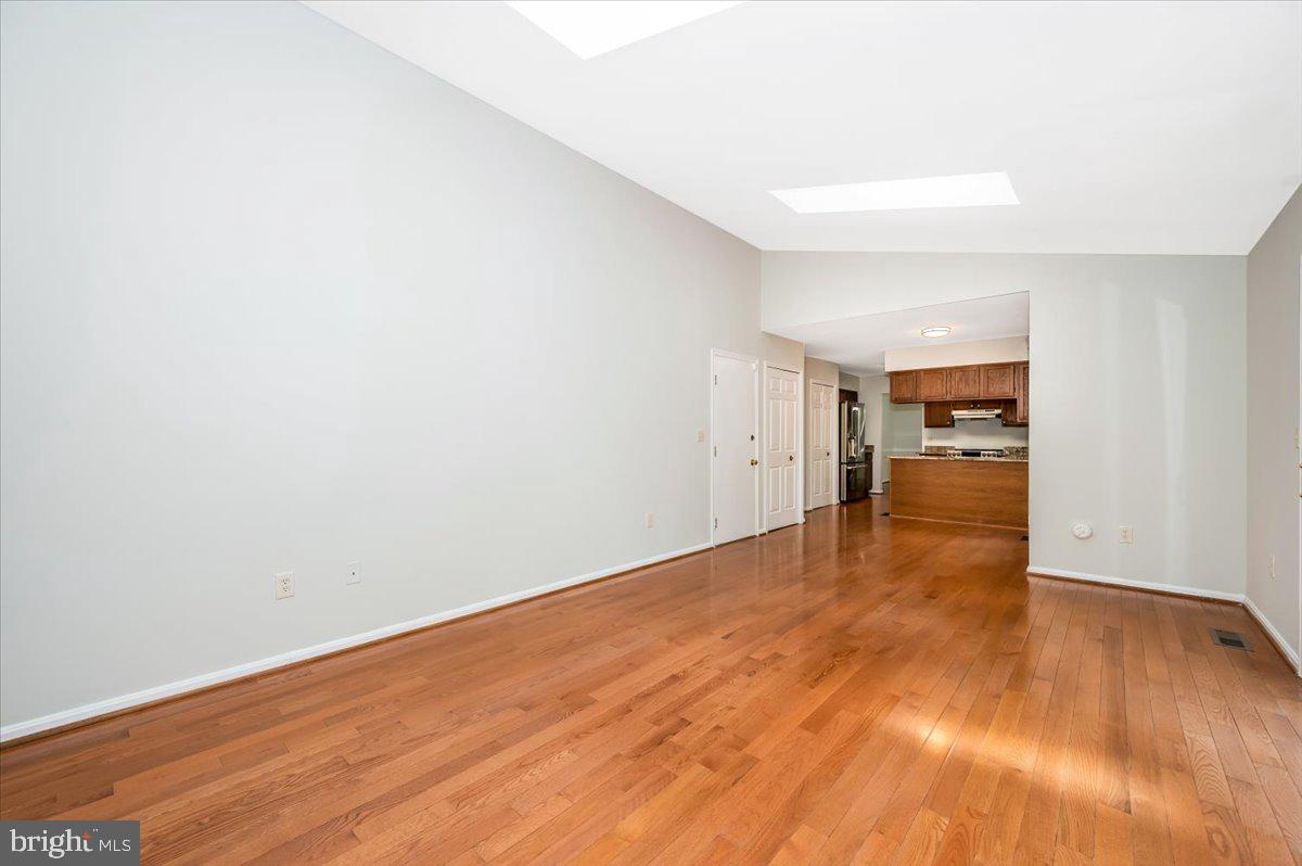 1402 Partridge Lane Bowie, MD 20721 - Photo 15 of 56 a view of empty room with wooden floor