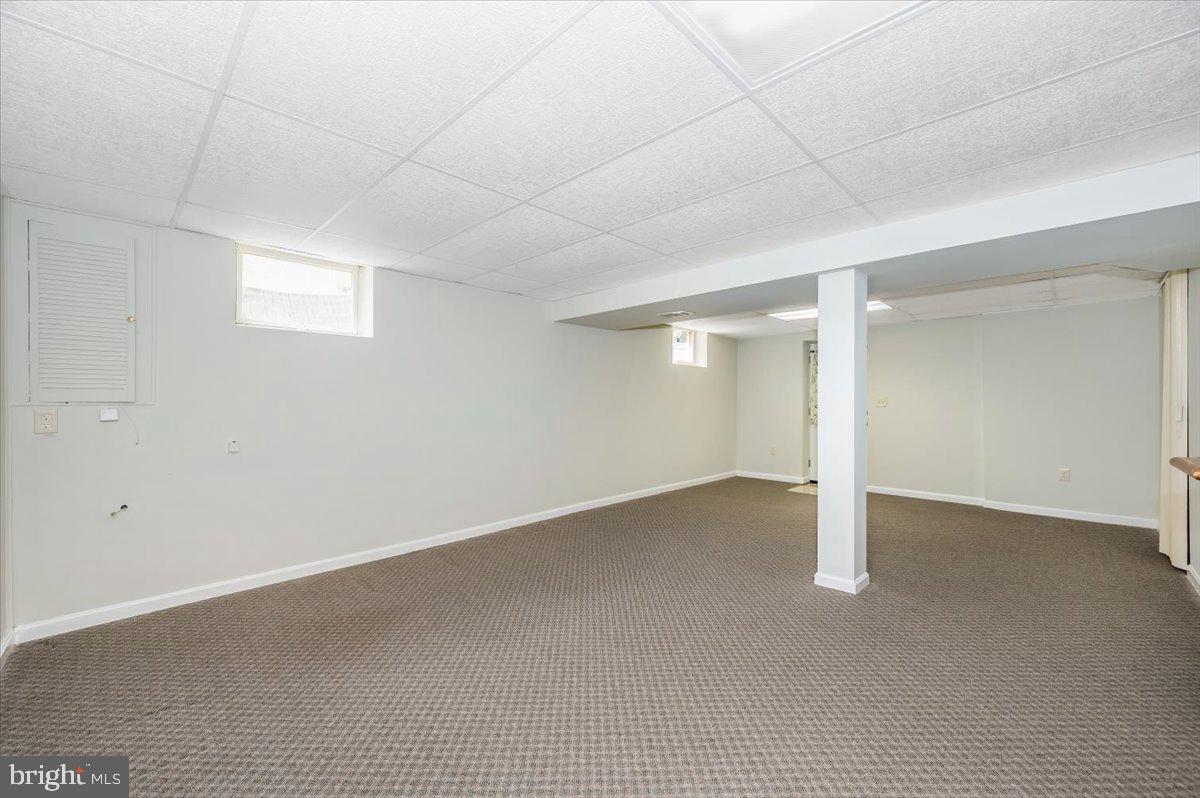 1402 Partridge Lane Bowie, MD 20721 - Photo 41 of 56 an empty room with a natural light
