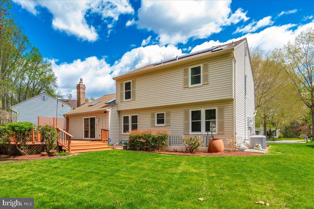 1402 Partridge Lane Bowie, MD 20721 - Photo 43 of 56 a front view of a house with a garden and plants