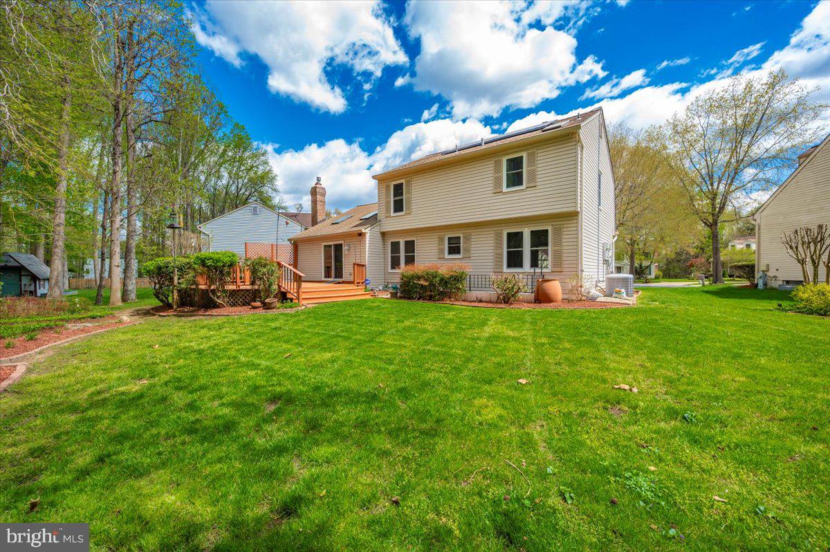 1402 Partridge Lane Bowie, MD 20721 - Photo 44 of 56 a front view of house with yard and green space
