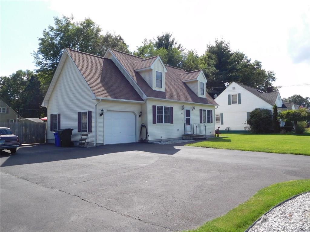 383 North Street Windsor Locks, CT 06096 - Photo 1 of 1 a view of a house with a yard and large tree