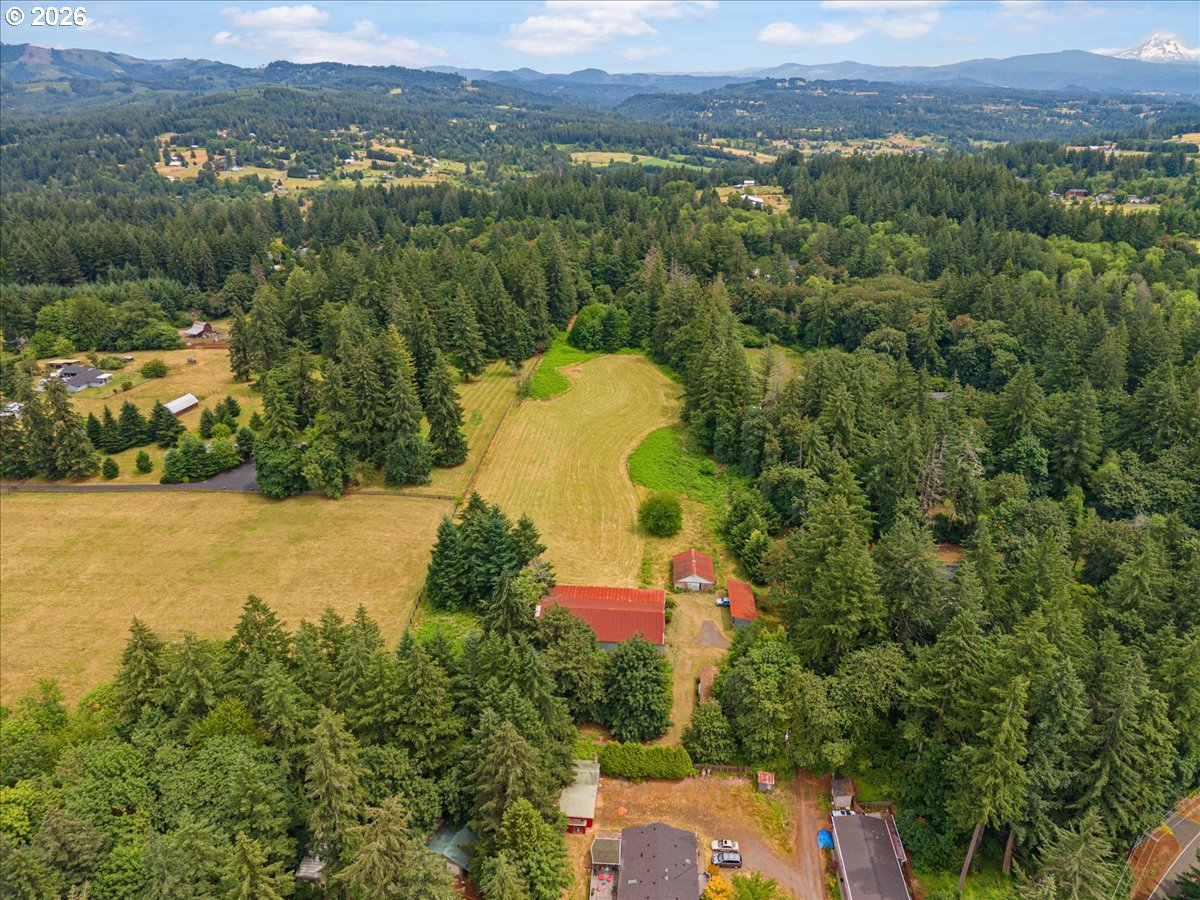 27214 Northeast Robinson Road Camas, WA 98607 - Photo 21 of 24 an aerial view of a house with a yard and lake view